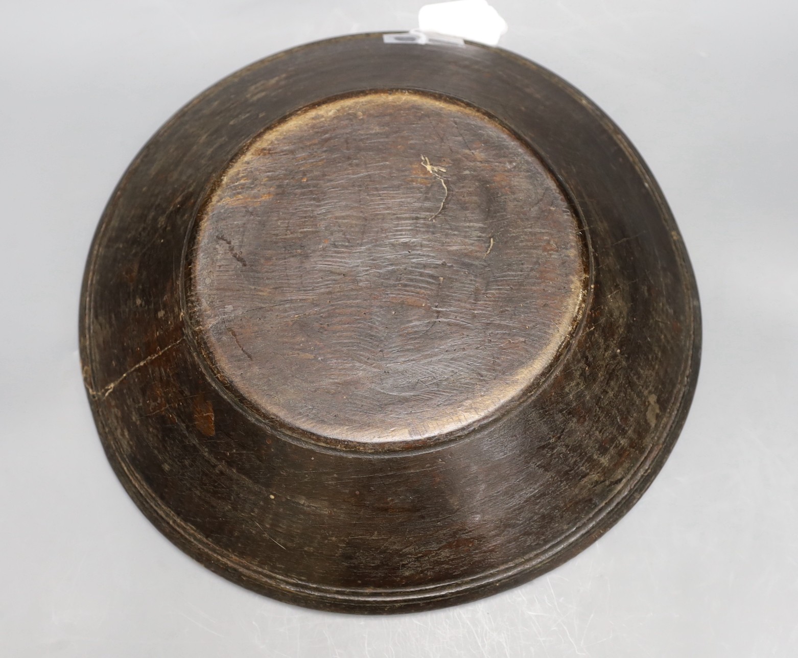 A 19th century wooden mazer, 40cm diameter